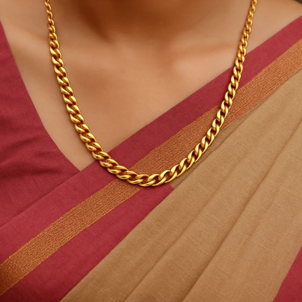 Simple necklace on red cotton saree